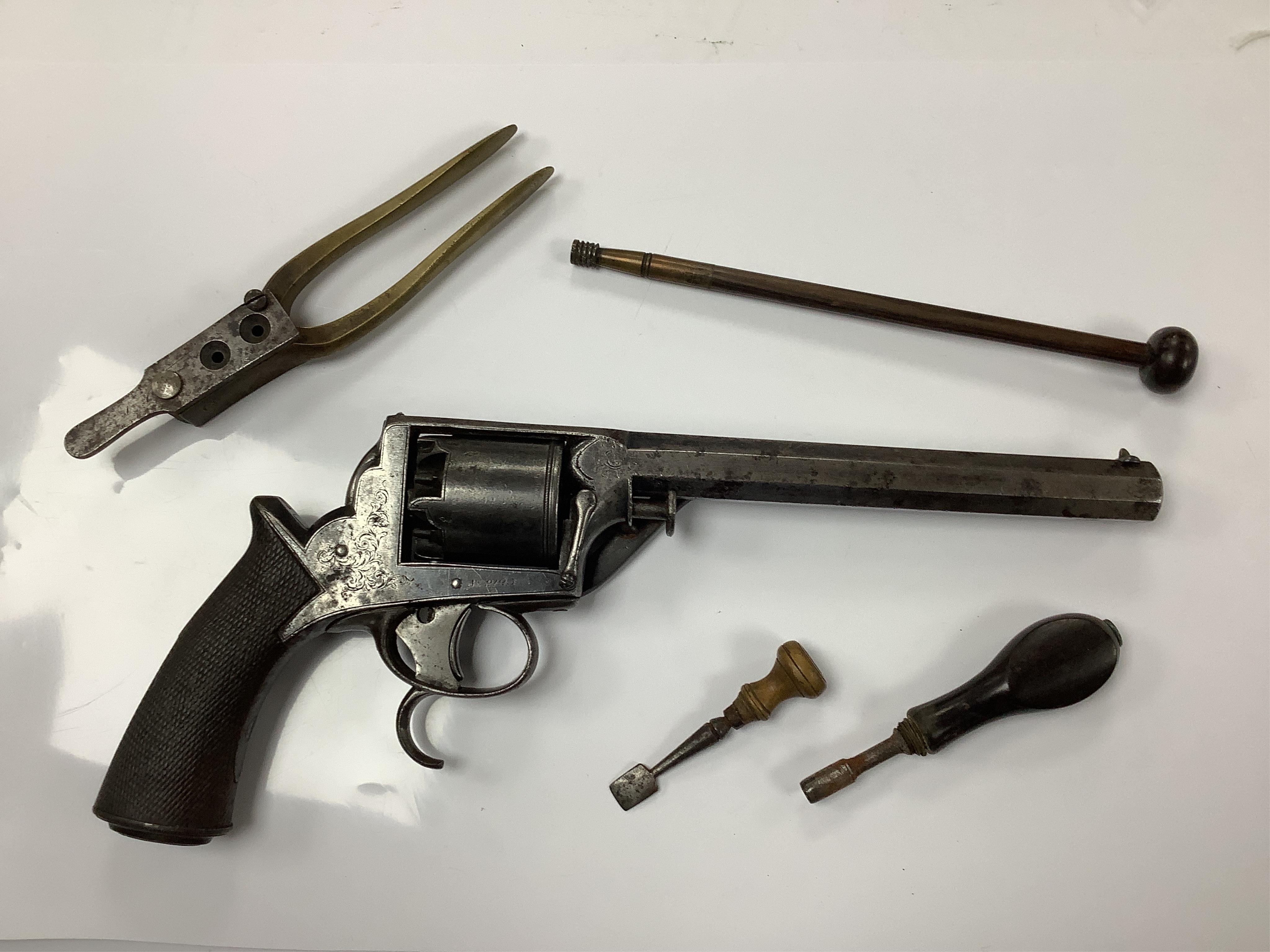 A scarce 36 bore 5 shot Tranter’s patent double trigger Dragoon percussion revolver retailed by T. Blissett, South Castle Street, Liverpool, number 2123, side lever detachable ramrod (replaced), foliate engraved frame, o